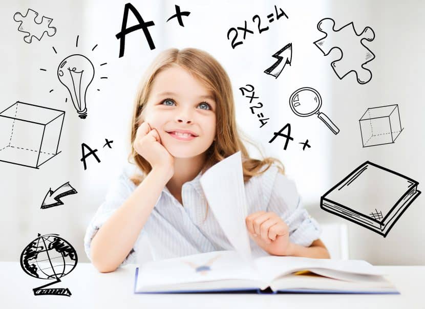 - SoundEnglish Young girl thinking happy thoughts with a book laid out in front of her.